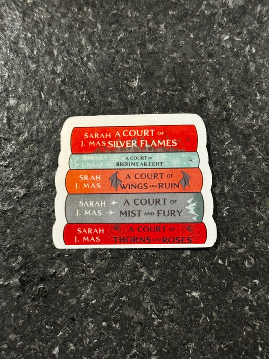 May include: A sticker featuring a stack of books with red, teal, orange, gray, and red spines. The books are titled "A Court of Silver Flames", "A Court of Rroins Alceht", "A Court of Wings and Ruin", "A Court of Mist and Fury", and "A Court of Thorns and Roses".